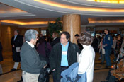 ..HEI's David Franco & Linda Corriveau meeting with Howard Mandel, main lobby, Hilton NY
