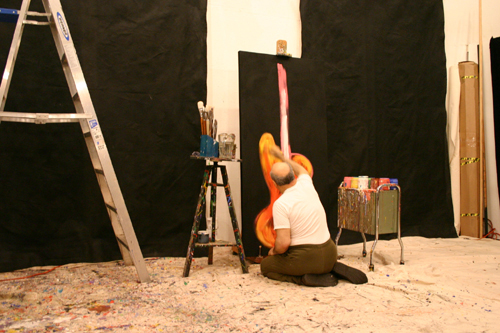 E.J. Gold painting an electric guitar for IAJE 2005