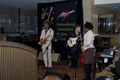 ..The High Brass Orchestra performing in front of E.J. Gold's JazzArt ® during the 2006 IAJE Conference.